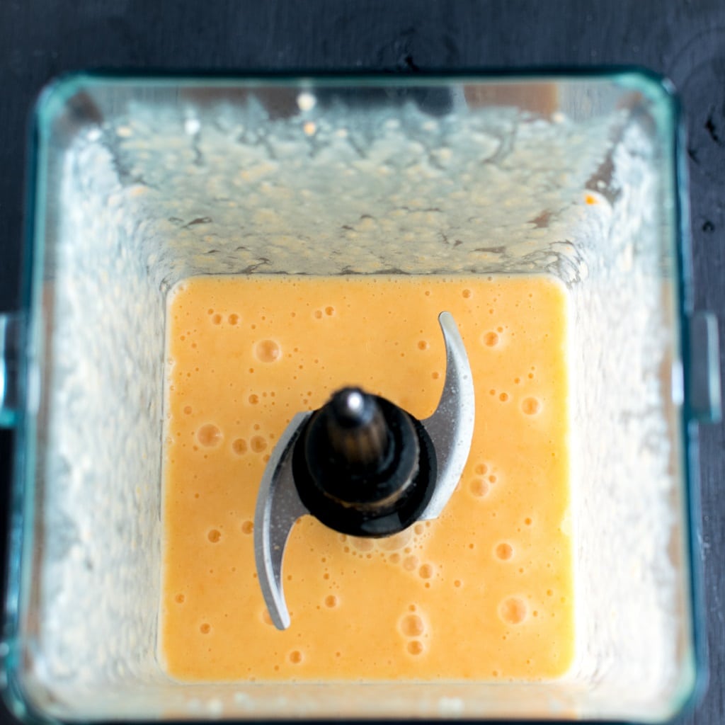 Vegan Habanero Cauliflower Sauce shown in s blender before poring over spaghetti | kiipfit.com